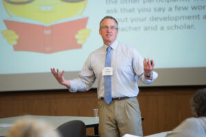 ornamental image of a teacher giving a presentation