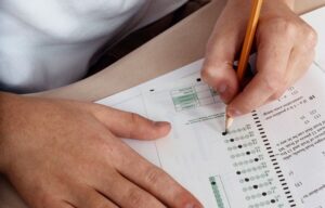 A student filling in bubbles on a test sheet